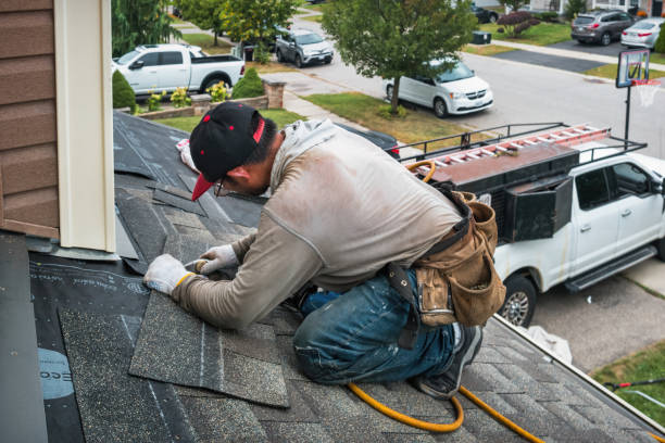 Professional Gutter Installation technician working in Western Springs, IL